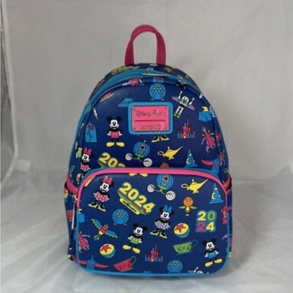 Loungefly Blue Disney Backpack with Pink Accents